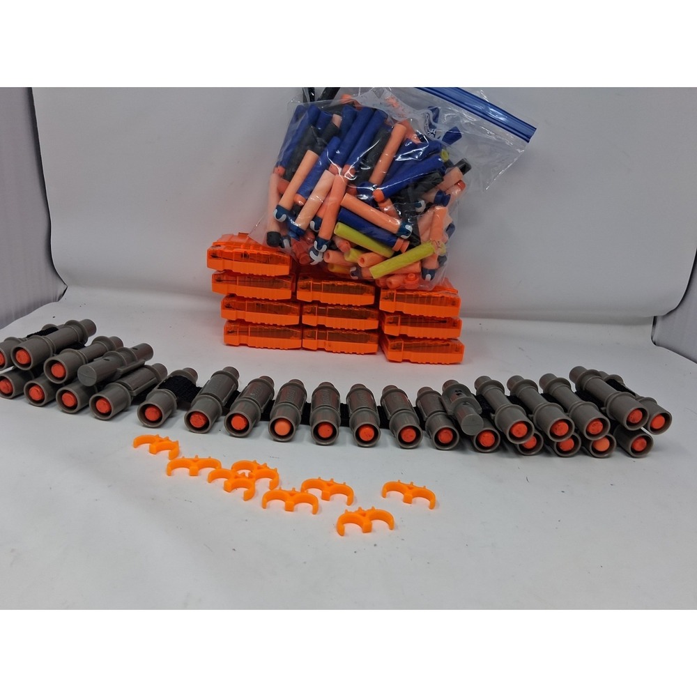 Lot Of Nerf Accesories 7 Clips A Bag Of Bullets And A Belt Of 25 Rounds. Q